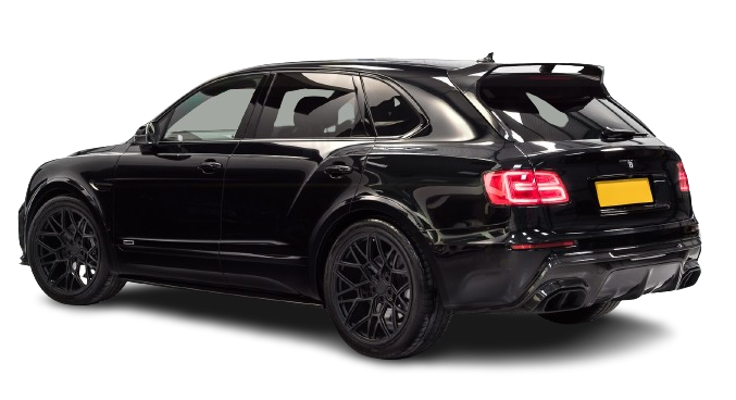 Black sports suv with a spoiler and custom wheels, parked with rear and side profile visible, on an isolated black background.