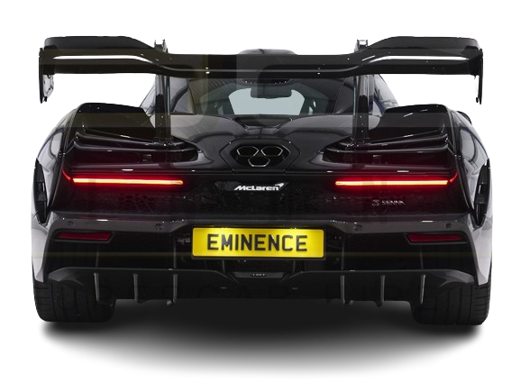 Rear view of a black mclaren senna sports car with a large wing, distinctive taillights, and a custom license plate reading "eminence".